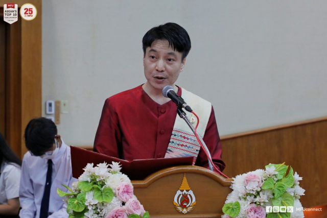 ประธานกรรมการจัดพิธีถวายผ้าป่าฯ กล่าวรายงานพิธีถวายผ้าป่าเพื่อการศึกษา ประจำปี 2565